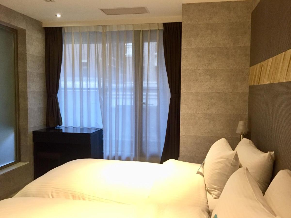 Fengjia Hotel Bell Taichung Buitenkant foto
